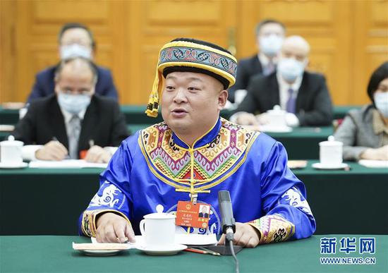  5月24日，全國人大代表宋慶禮參加湖北代表團(tuán)的審議并發(fā)言。新華社記者 黃敬文 攝